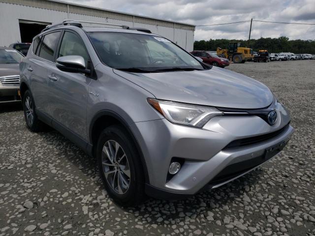 JTMRJREV6JD213915 - 2018 TOYOTA RAV4 HV LE SILVER photo 4