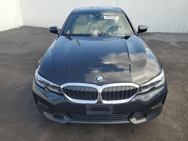 3MW5R7J04N8C54985 - 2022 BMW 330XI BLACK photo 5