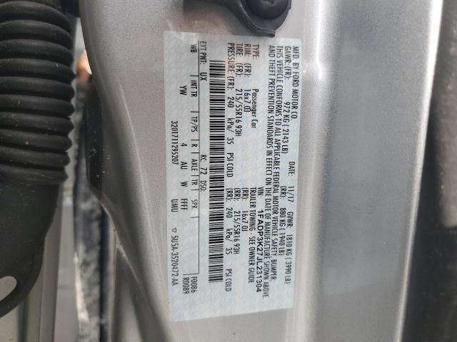 1FADP3K27JL231304 - 2018 FORD FOCUS SE Silber Foto 12