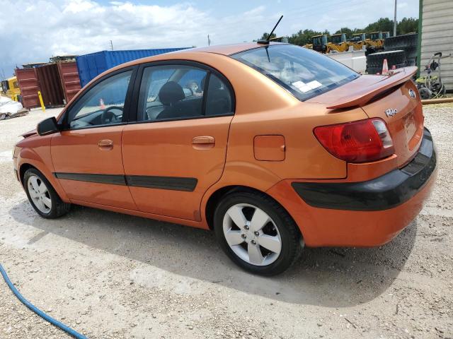 KNADE223296572278 - 2009 KIA RIO BASE ORANGE photo 2