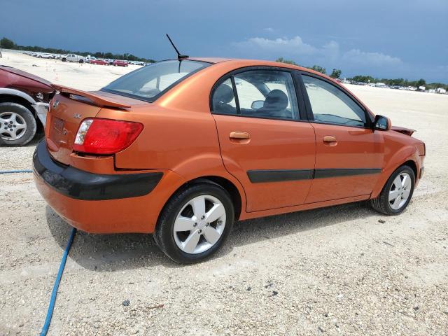 KNADE223296572278 - 2009 KIA RIO BASE ORANGE photo 3