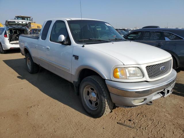 1FTRX18L6YKA84350 - 2000 FORD F150 WHITE photo 4