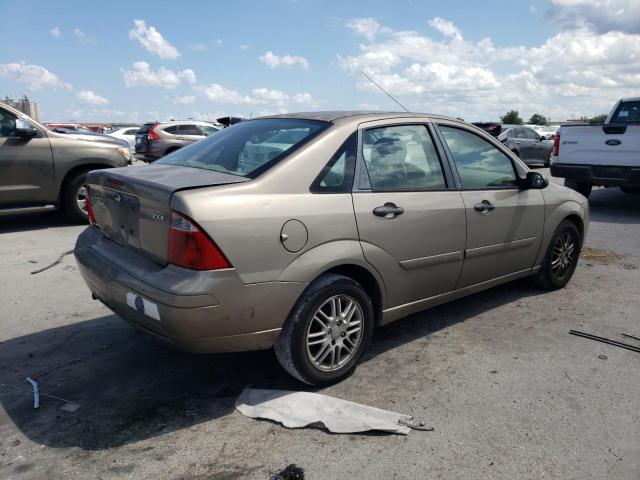 1FAFP34N85W114786 - 2005 FORD FOCUS ZX4 GOLD photo 3