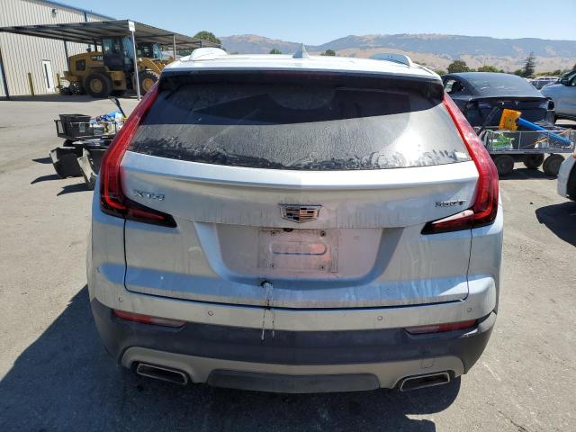 1GYFZCR48MF019416 - 2021 CADILLAC XT4 PREMIUM LUXURY SILVER photo 6