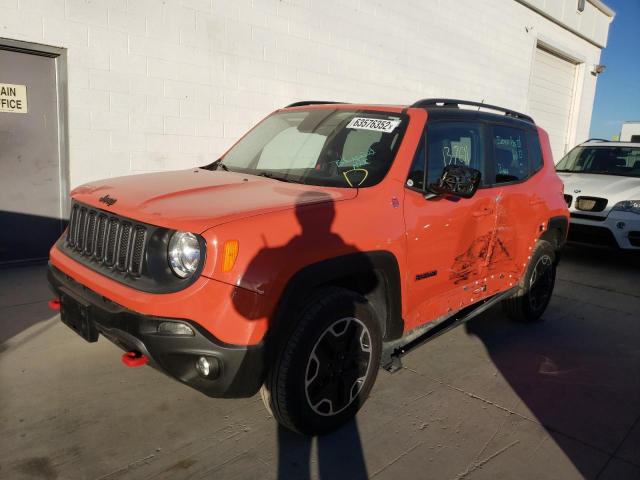 ZACCJBCT2GPD09677 - 2016 JEEP RENEGADE TRAILHAWK ORANGE photo 2