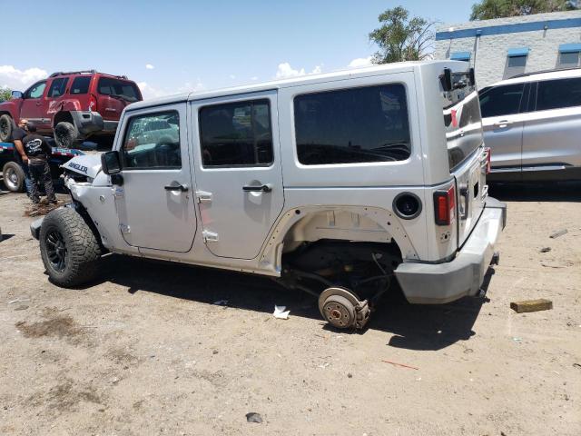 1C4BJWEG6CL196074 - 2012 JEEP WRANGLER U SAHARA SILVER photo 2