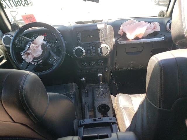 1C4BJWEG6CL196074 - 2012 JEEP WRANGLER U SAHARA SILVER photo 8