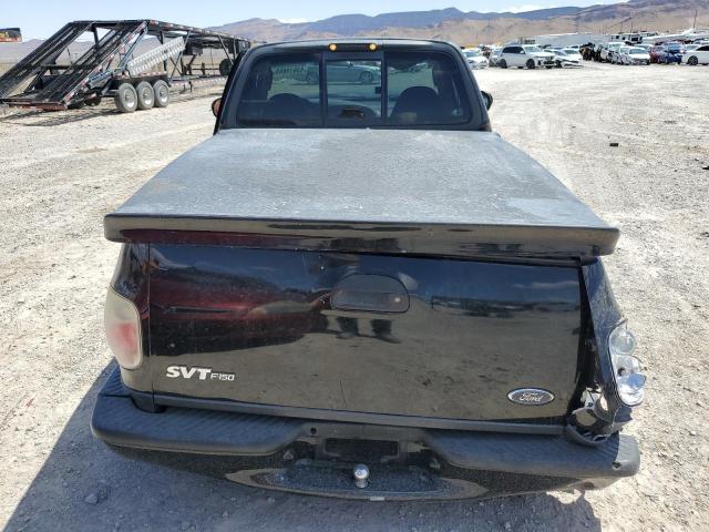 2FTRF073X4CA75485 - 2004 FORD F150 SVT LIGHTNING BLACK photo 6