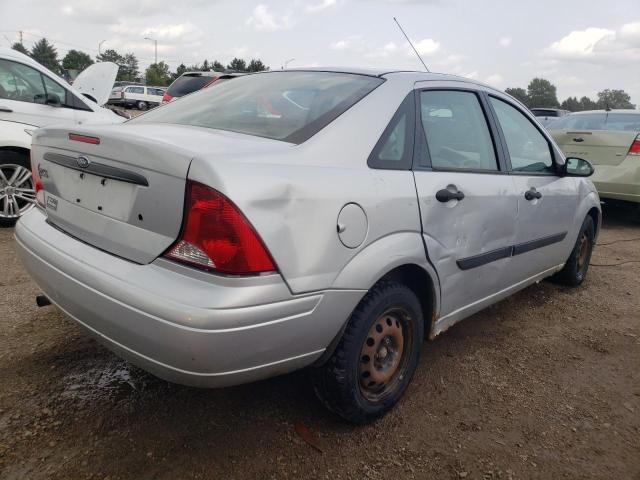 1FAFP33P34W197822 - 2004 FORD FOCUS LX SILVER photo 3