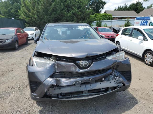 JTMBFREV6JJ193976 - 2018 TOYOTA RAV4 LE Gris photo 5