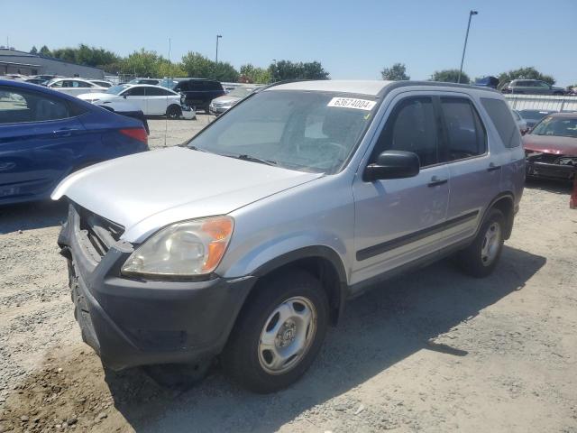 JHLRD78472C077576 - 2002 HONDA CR-V LX SILVER photo 1