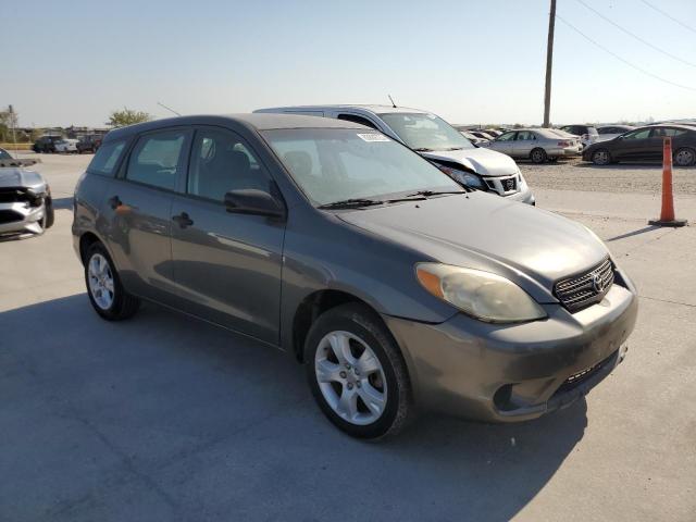 2T1KR32E37C665709 - 2007 TOYOTA COROLLA MA XR GRAY photo 4