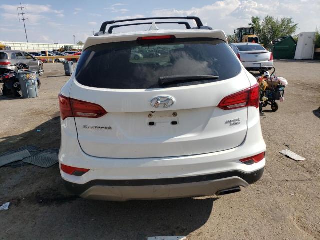 5NMZUDLB1JH081821 - 2018 HYUNDAI SANTA FE S WHITE photo 6