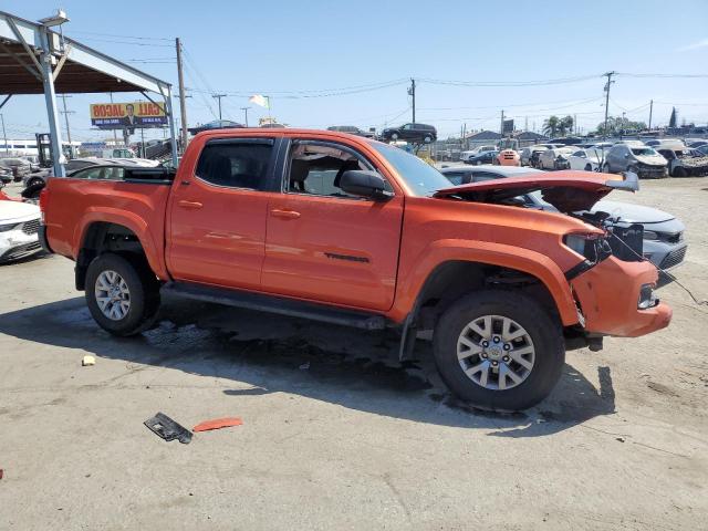 3TMAZ5CN8HM030872 - 2017 TOYOTA TACOMA DOUBLE CAB ORANGE photo 4