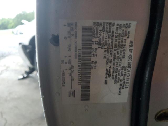 1LNHM81W9XY630812 - 1999 LINCOLN TOWN CAR EXECUTIVE SILVER photo 12