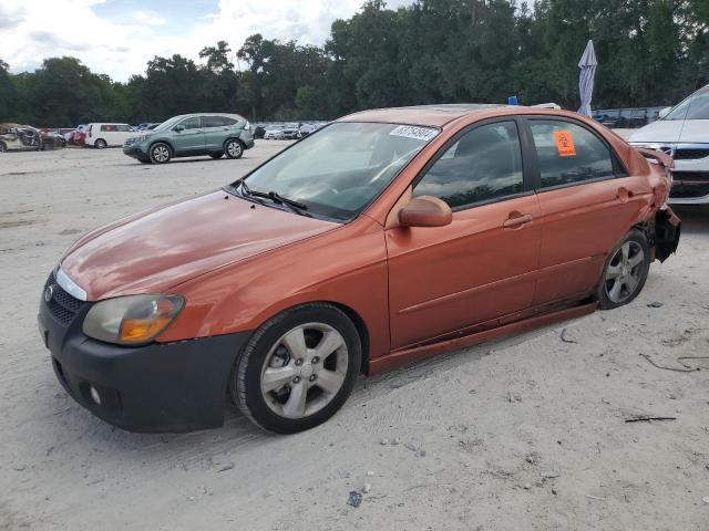 KNAFE221095024194 - 2009 KIA SPECTRA EX ORANGE photo 1