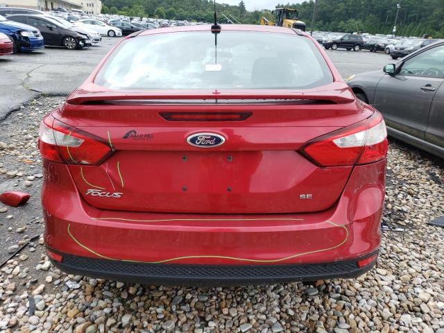 1FAHP3F24CL264601 - 2012 FORD FOCUS SE RED photo 6