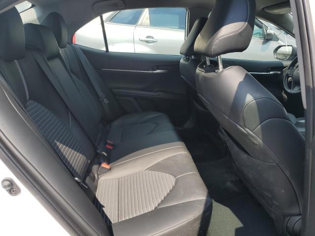 4T1G11AKXPU830193 - 2023 TOYOTA CAMRY SE NIGHT SHADE WHITE photo 10