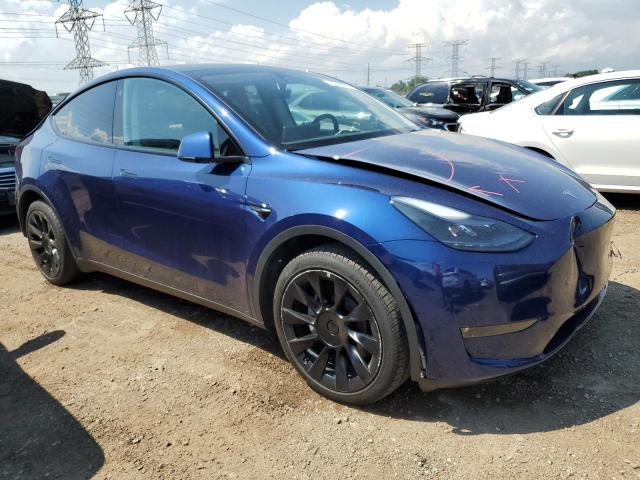 7SAYGDEE9PF750599 - 2023 TESLA MODEL Y ლურჯი ფოტო 4