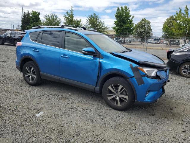 JTMRFREVXJJ740570 - 2018 TOYOTA RAV4 ADVENTURE BLUE photo 4