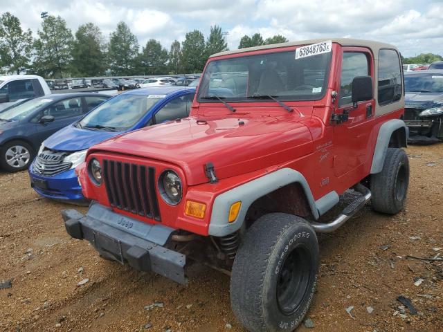 1J4FA49S9YP755549 - 2000 JEEP WRANGLER / SPORT RED photo 1