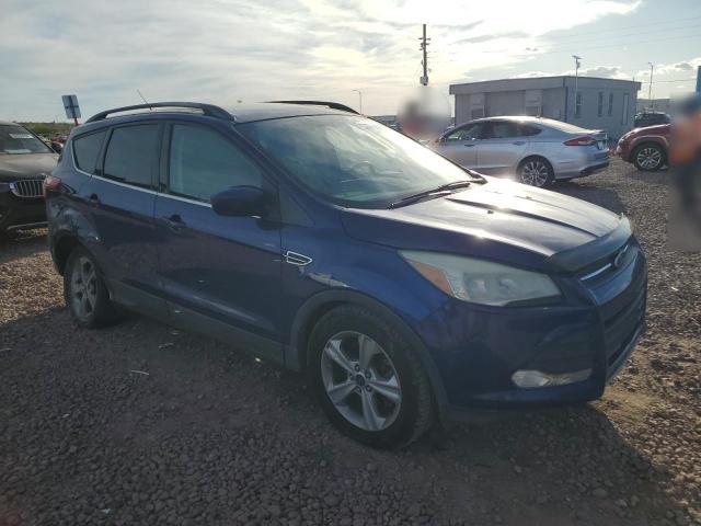 1FMCU0G92EUD65958 - 2014 FORD ESCAPE SE BLUE photo 4