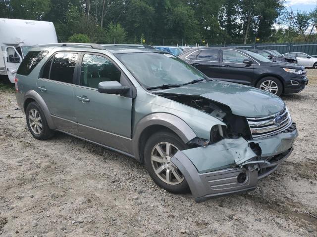 1FMDK05W38GA08911 - 2008 FORD TAURUS X SEL GRAY photo 4