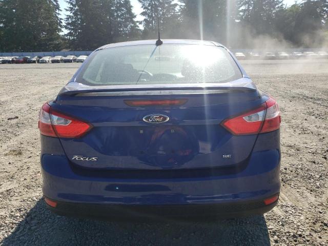 1FAHP3F24CL423634 - 2012 FORD FOCUS SE BLUE photo 6