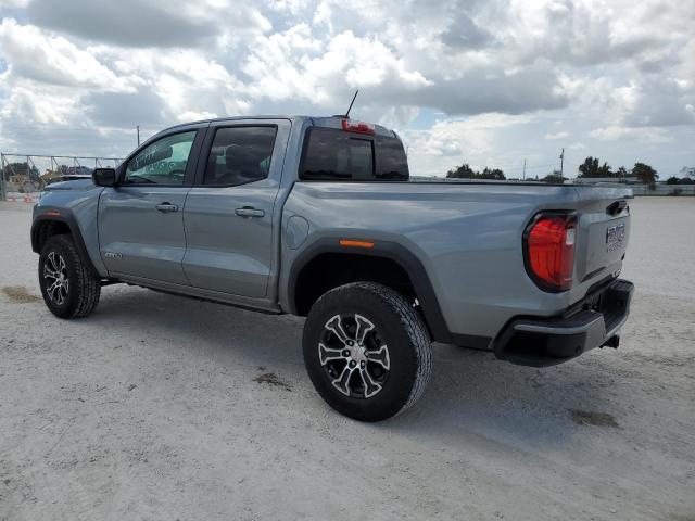 1GTP6DEK5P1137311 - 2023 GMC CANYON AT4 SILVER photo 2