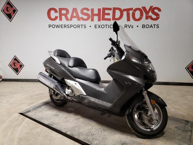 JH2PF01188K600700 - 2008 HONDA FSC600 D GRAY photo 1