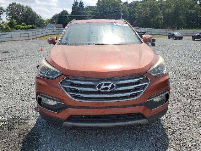 5XYZU3LB8HG454755 - 2017 HYUNDAI SANTA FE S ORANGE photo 5