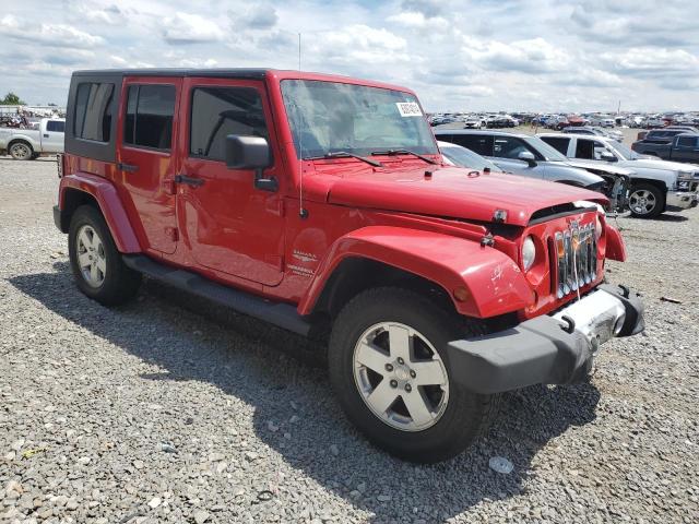 1J4BA5H13AL221439 - 2010 JEEP WRANGLER U SAHARA RED photo 4