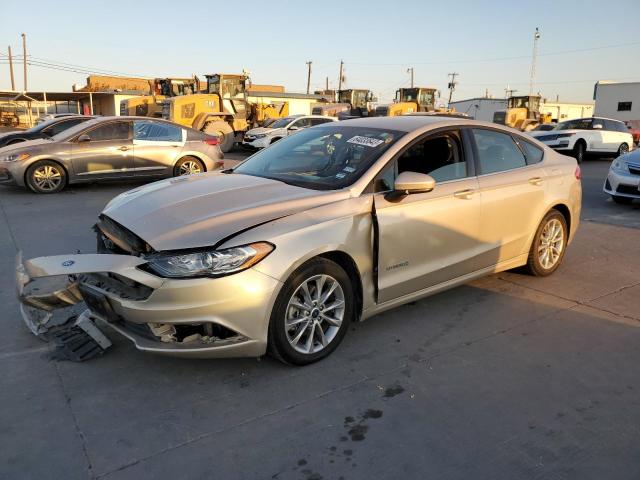 3FA6P0LU7HR357830 - 2017 FORD FUSION SE HYBRID GOLD photo 1