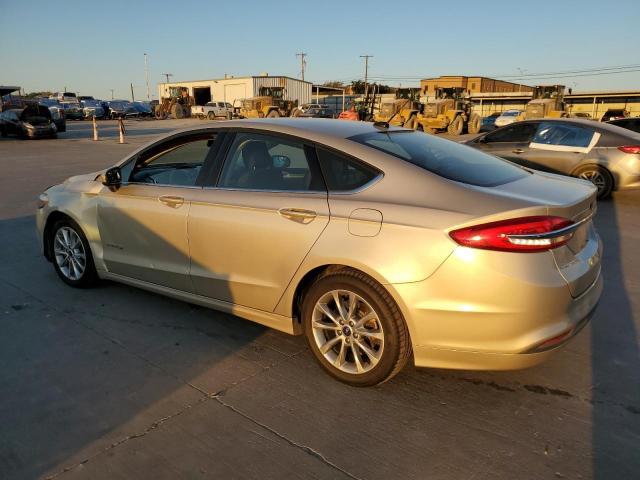 3FA6P0LU7HR357830 - 2017 FORD FUSION SE HYBRID GOLD photo 2