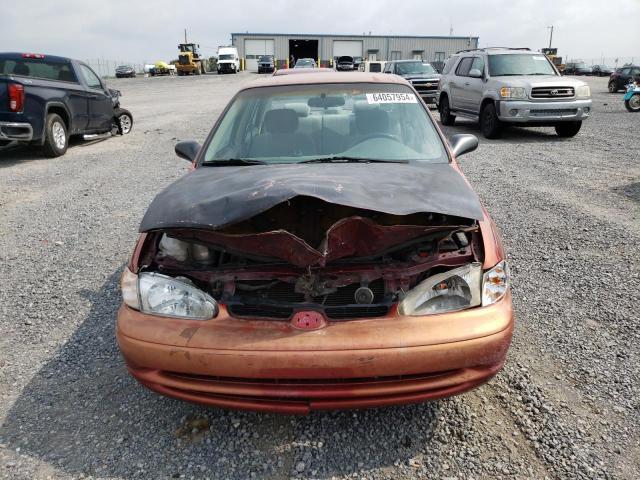 1Y1SK52801Z418411 - 2001 CHEVROLET GEO PRIZM BASE RED photo 5
