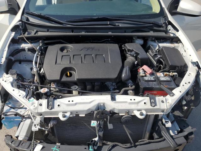 5YFBURHE4KP859506 - 2019 TOYOTA COROLLA L WHITE photo 11