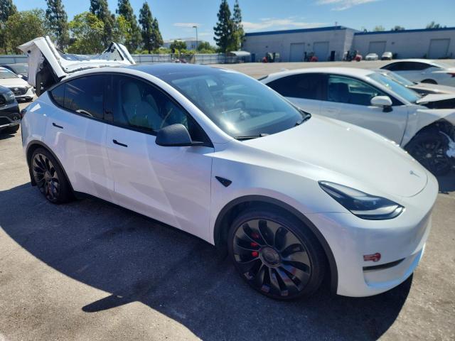 7SAYGDEF0PF902567 - 2023 TESLA MODEL Y თეთრი ფოტო 4