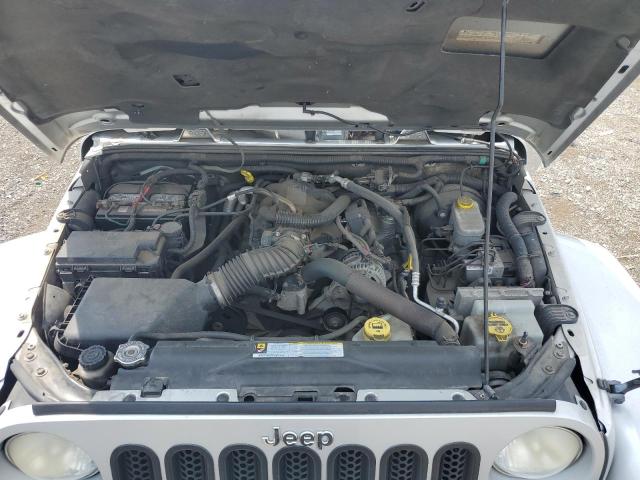 1J4HA5H18AL180445 - 2010 JEEP WRANGLER U SAHARA SILVER photo 12