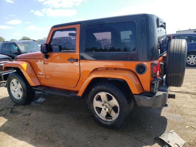 1J4AA5D11AL192024 - 2010 JEEP WRANGLER SAHARA ORANGE photo 2