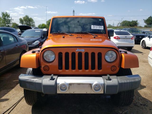 1J4AA5D11AL192024 - 2010 JEEP WRANGLER SAHARA ORANGE photo 5