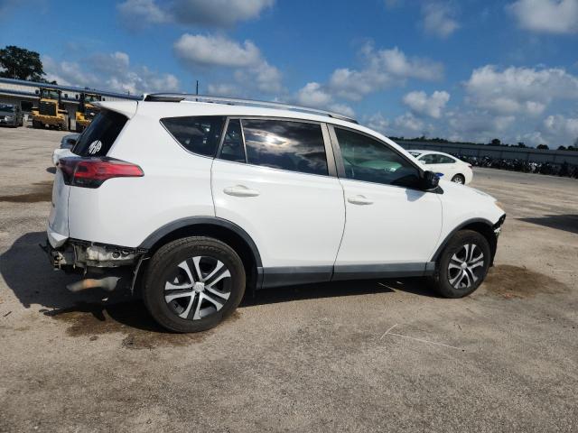 2T3ZFREV6HW354210 - 2017 TOYOTA RAV4 LE WHITE photo 3