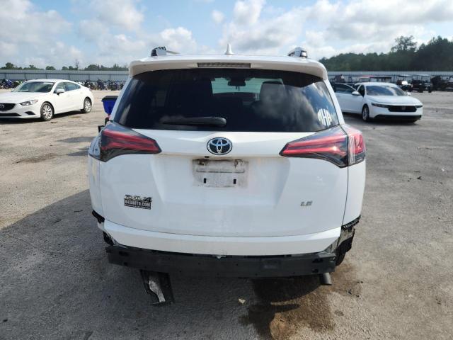 2T3ZFREV6HW354210 - 2017 TOYOTA RAV4 LE WHITE photo 6