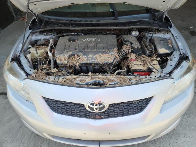 2T1BU4EE8AC525937 - 2010 TOYOTA COROLLA BASE SILVER photo 11