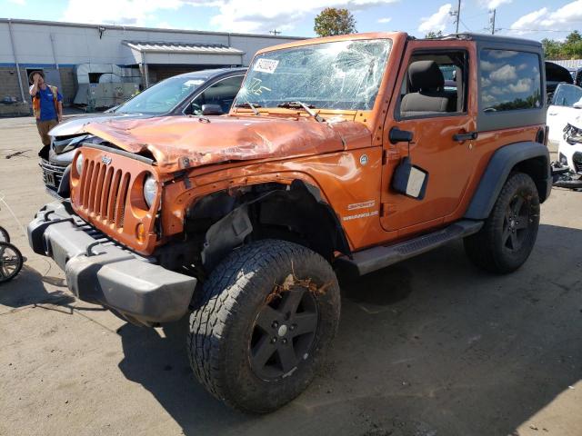 1J4AA2D19BL574074 - 2011 JEEP WRANGLER SPORT ORANGE photo 1