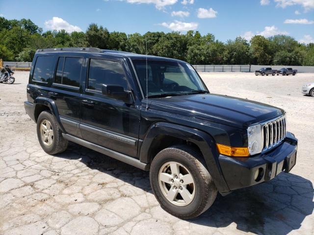 1J8HH48K57C556993 - 2007 JEEP COMMANDER BLACK photo 4