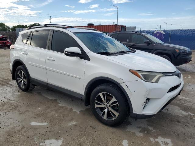 2T3WFREV5HW337126 - 2017 TOYOTA RAV4 XLE WHITE photo 4