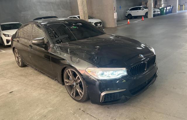 WBAJS7C01LCD90676 - 2020 BMW M550XI BLACK photo 1