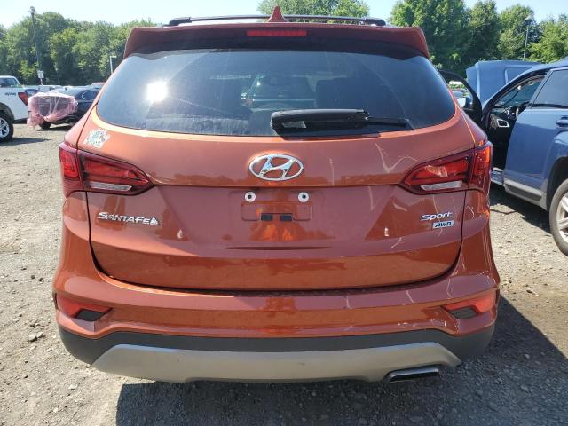 5XYZUDLB0HG489070 - 2017 HYUNDAI SANTA FE S ORANGE photo 6