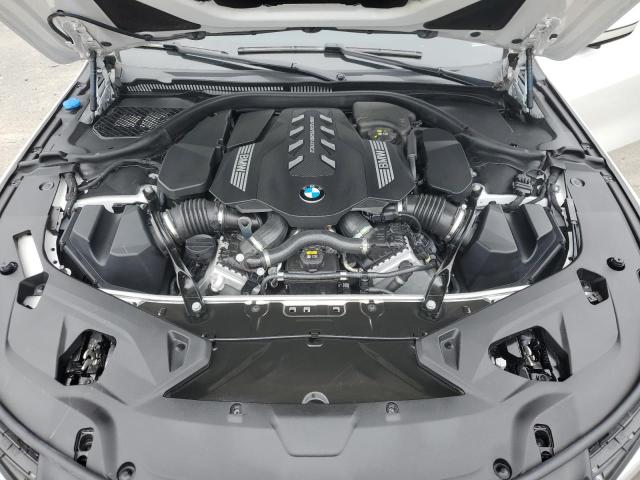 WBAGV8C06NCG91048 - 2022 BMW M850XI WHITE photo 11