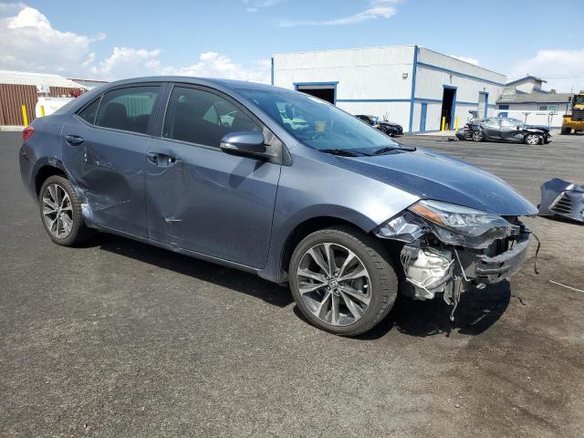 5YFBURHE1KP915952 - 2019 TOYOTA COROLLA L Niebieski zdjęcie 4